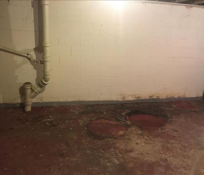 Basement floor with dried sewage