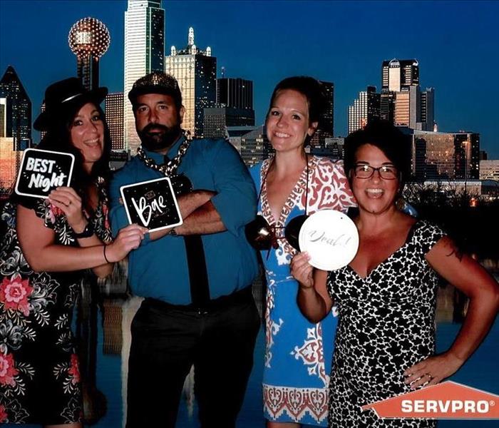 SERVPRO employees in photo booth at 2021 SERVPRO Convention