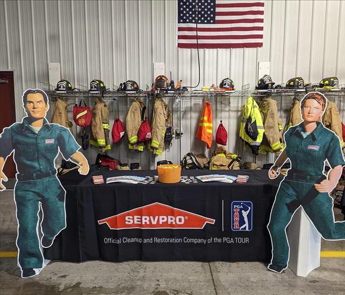 SERVPRO Heros, Blaze and Stormy, with table display