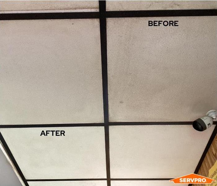 Soot stained ceiling tiles before and after cleaning